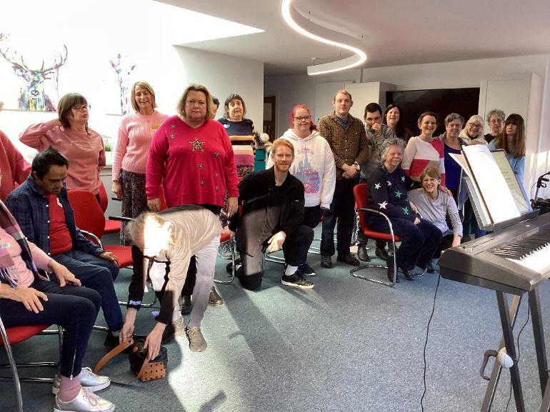 Callum with clients after they had learnt some steps