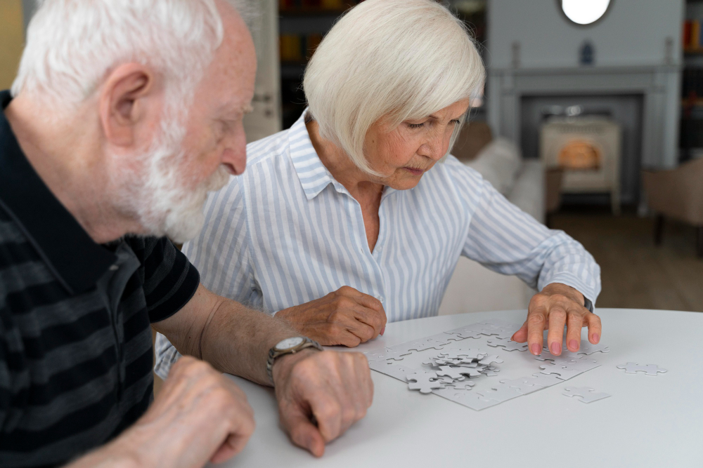 older couple looking at housing plans