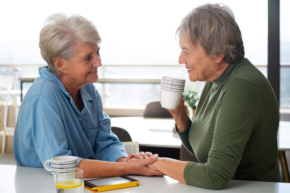 two older woman having a coffee