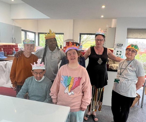 Clients wearing their crowns